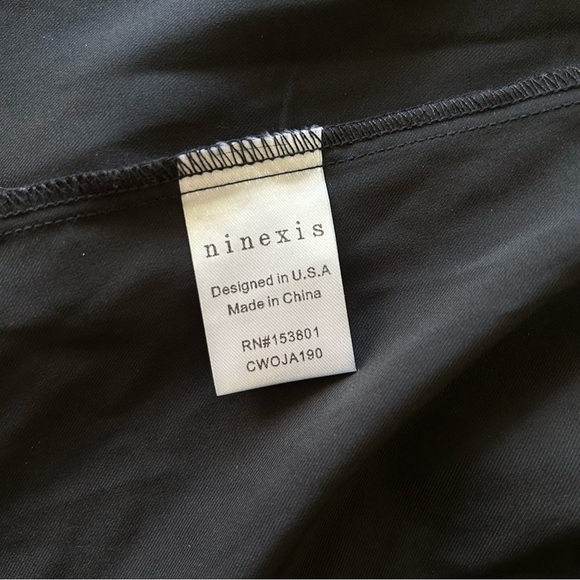 Ninexis | Black Women's Jacket with Roll Sleeves - Picture 8 of 9